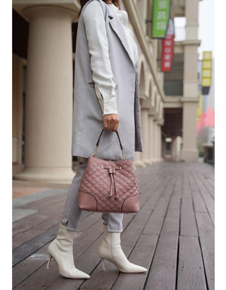 Wendy Bucket Bag with Wristlet: A Luxurious Statement Piece