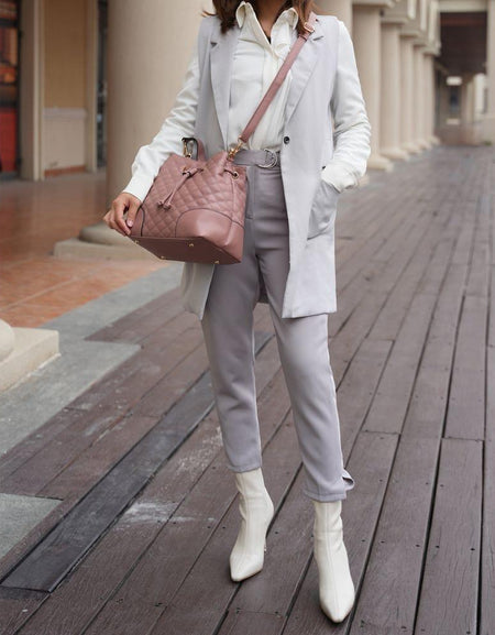 Wendy Bucket Bag with Wristlet: A Luxurious Statement Piece