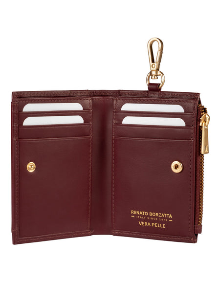 RB1085X | Portafogli Donna Made in Italy in Vera Pelle Morbida Sauvage. Accessori in metallo Oro Opaco. Colore Bordeaux. Dimensioni (da chiuso): cm 8 x 11,5 x 2-1