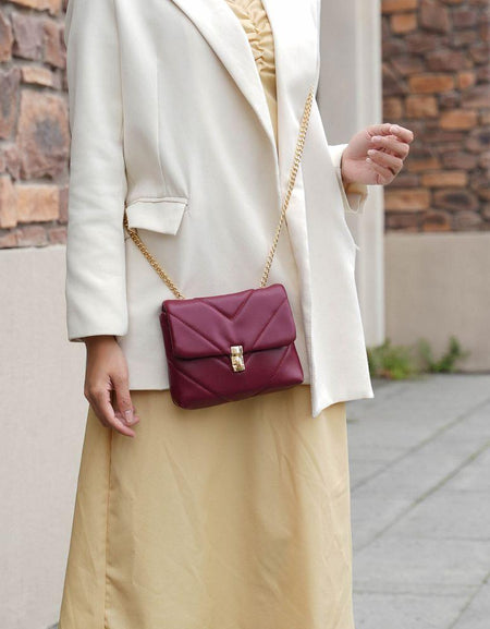 Ellie Small Crossbody Bag: A Chic Statement of Elegance