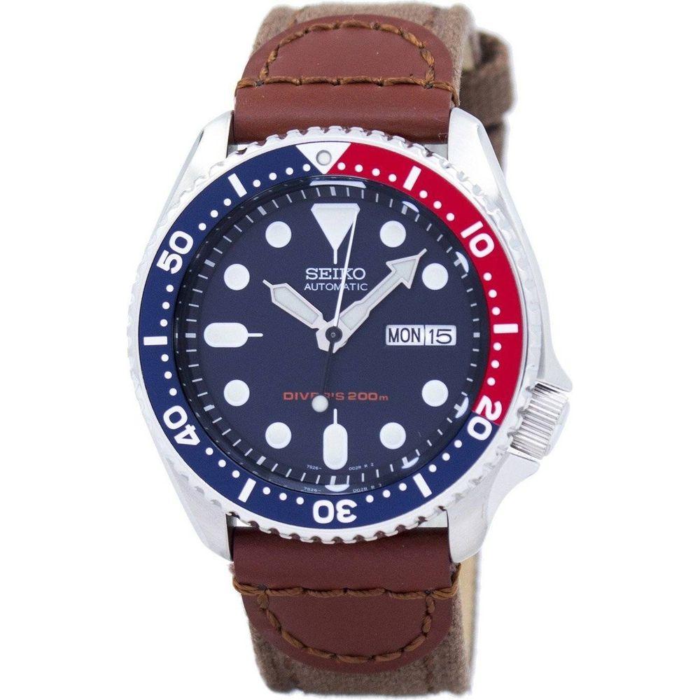 Seiko Men's SKX009K1-var-NS1 Automatic Diver's Canvas Strap Watch - Dark Blue Dial, Red and Blue Bezel